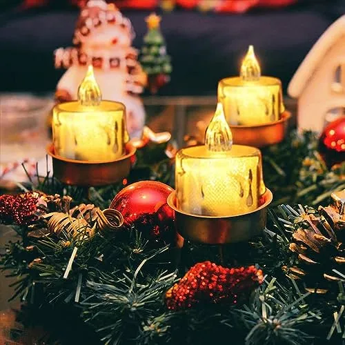 The Decor Affair 24PCS Enchanted Flameless Electric Candles: Flickering Tea Lights with Realistic Candlelight Effect, Perfect for Creating Magical Evenings.