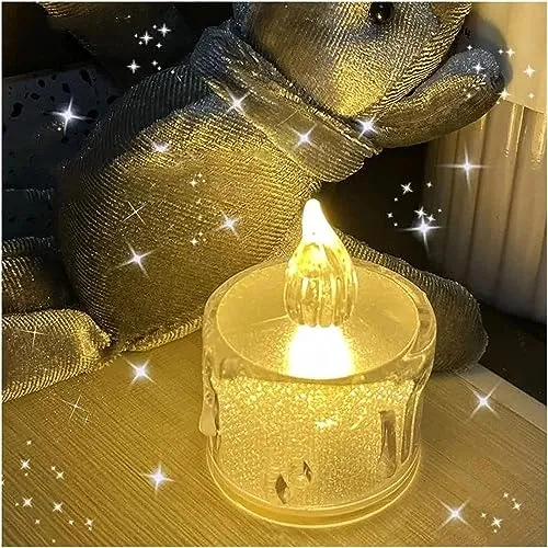 The Decor Affair 24PCS Enchanted Flameless Electric Candles: Flickering Tea Lights with Realistic Candlelight Effect, Perfect for Creating Magical Evenings.
